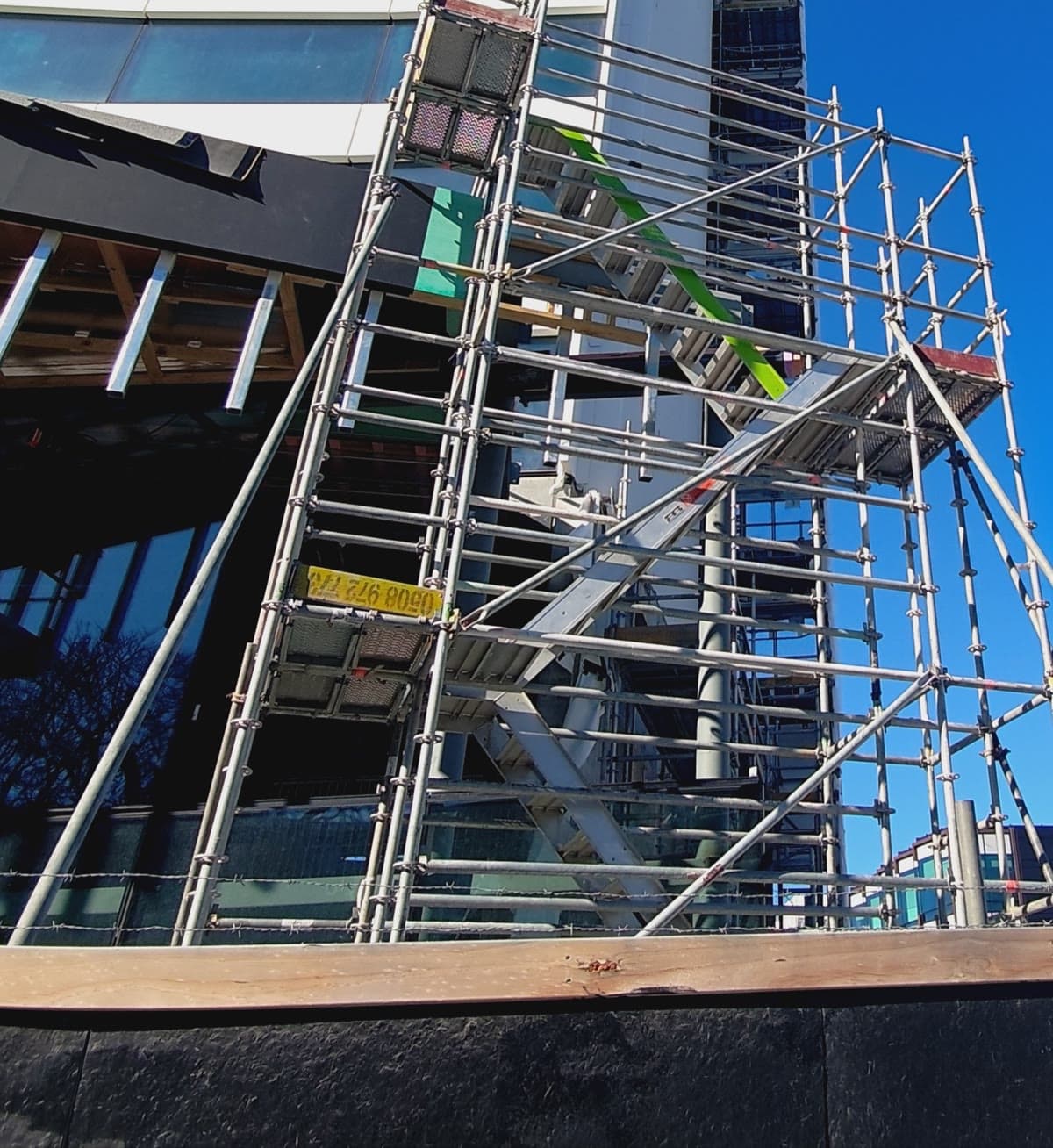 Scaffolding on a Christchurch construction site, builder website design New Zealand